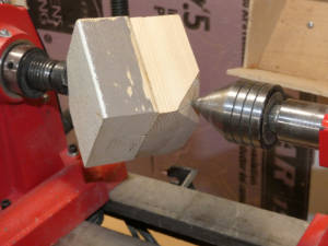  A cube with corners cutoff <br>mounted in lathe